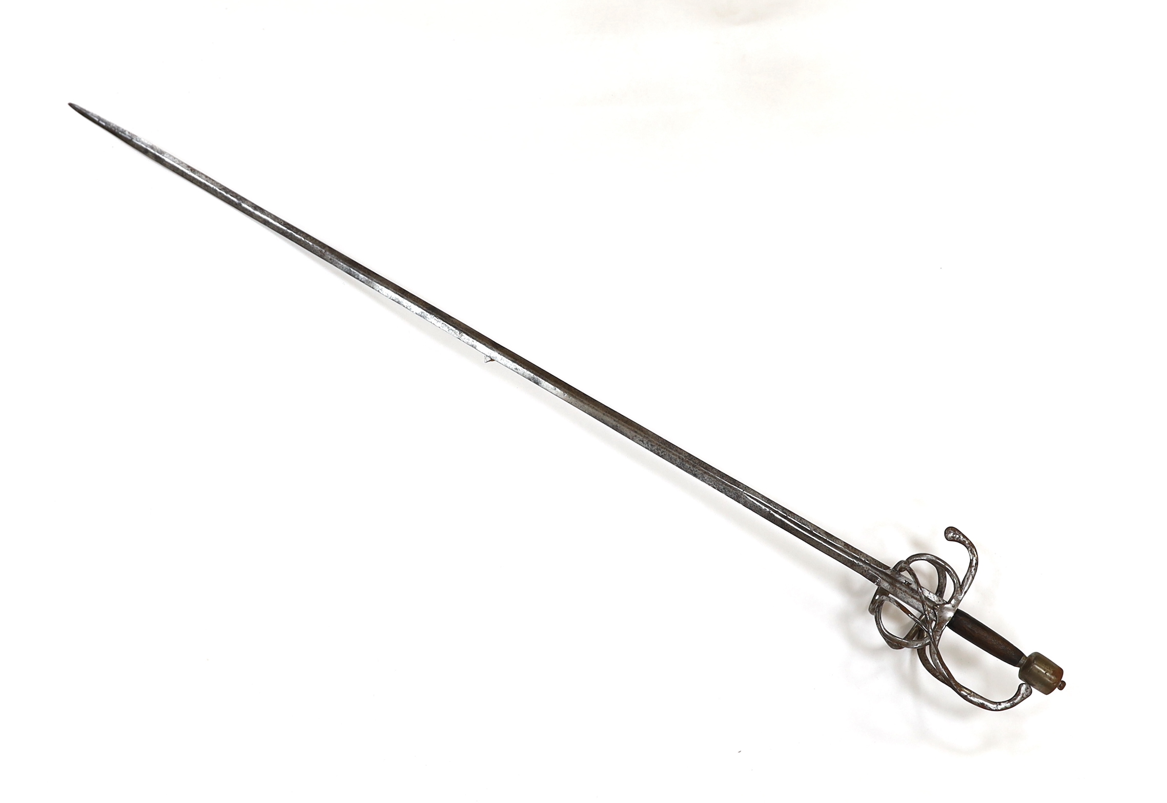 A swept hilt rapier, c.1620, blade fullered at the forte, iron guard of conventional form with later pommel and wooden grip, blade 113cm